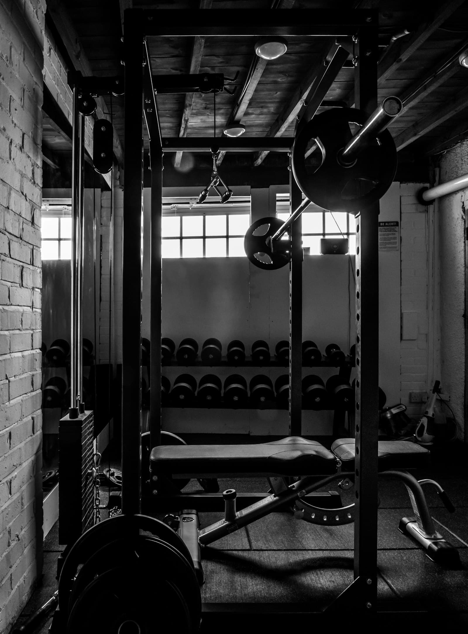Weight racks on a gym training floor