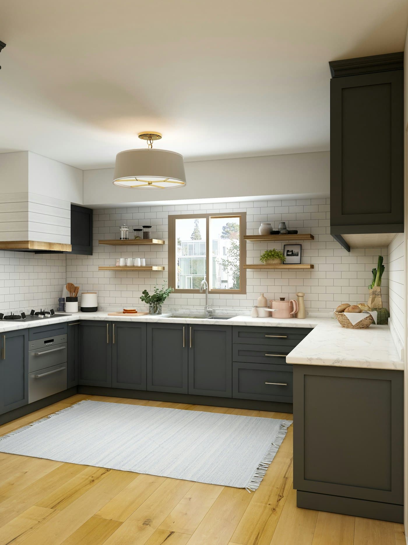Kitchen with slate cabinets, marble counters and white tile